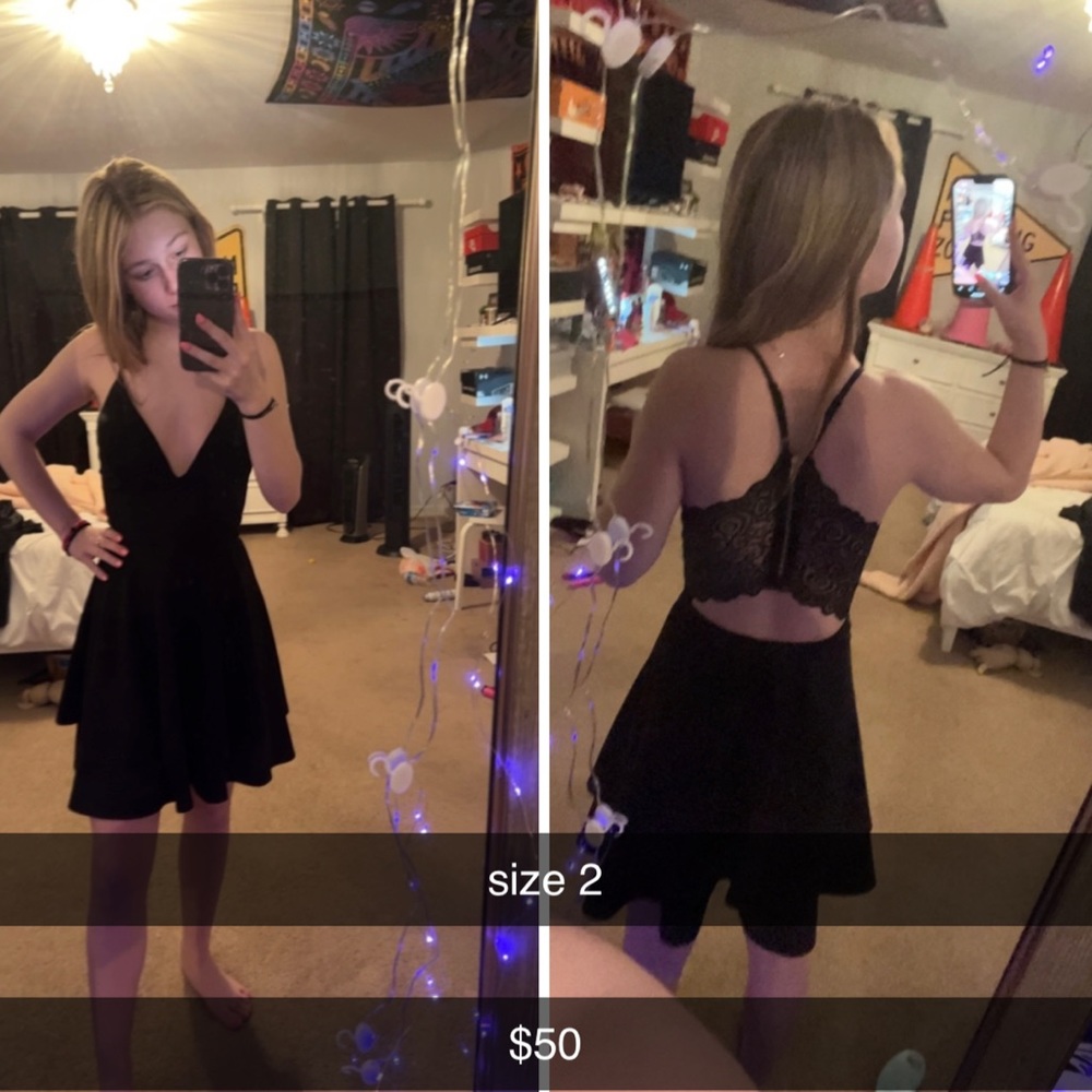Cutest Black dress, the back is gorgeous. size 2
